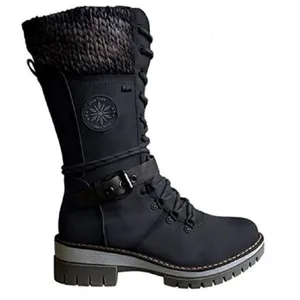 Close-up of black mid-calf boot with knitted collar and buckle strap