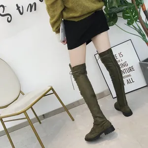 Back view of women's olive green suede lace-up over-the-knee flat boots