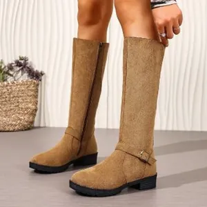 Elegant tan suede knee-high knight boots for women featuring side zipper and buckle detail