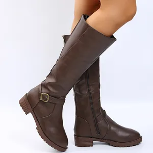 Detailed view of women's dark brown low heel knee-high rider boots with side zipper