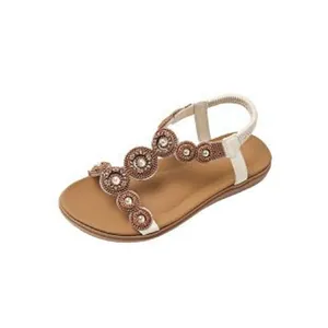 Elegant Bohemian flat sandals with intricate beaded circular patterns and pearl accents