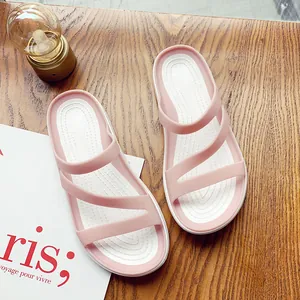 Casual pink and white flat sandals for women with three diagonal straps detail
