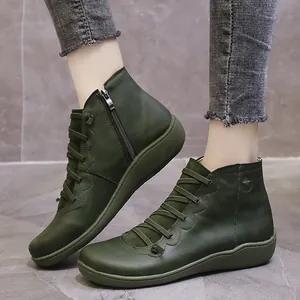 Women's casual dark green leather ankle boots with side zipper and lace-up design.