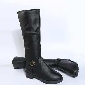 Detailed view of black faux leather knee-high knight boots with elegant gold buckle