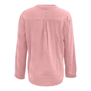 Back view detail of a pink slub cotton shirt showing the pleat and stand collar design