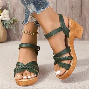 Dark green women's chunky heel sandals with woven strap detail and ankle buckle