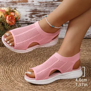 Detailed view of pink mesh peep-toe wedge sandals showing the 4.0cm comfortable platform heel