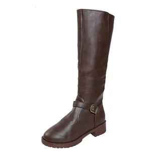 Detailed view of brown faux leather tall knight boots with vintage ankle buckle detail