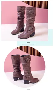 Vintage brown slouchy tall knight boots with decorative buckles and sturdy block heels