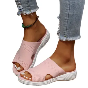 Stylish pink knitted flat slide sandals for women with breathable mesh upper