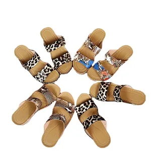 Variety of vintage leopard and snakeskin print wedge sandals for summer beach wear