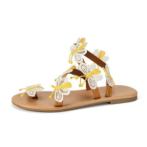 Bohemian flat Roman sandals featuring delicate white and yellow lace butterfly decorations