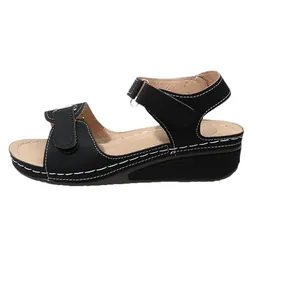 Black women's wedge sandals with open-toe design and velcro straps for comfort