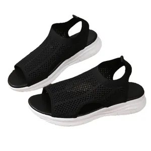 Breathable black knit sports sandals for women with thick white cushioned soles
