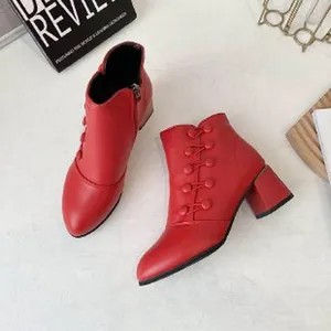 Vibrant red women's block heel ankle boots featuring stylish decorative button details