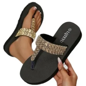 Elegant black wedge platform flip-flops for women featuring sparkling rhinestone straps