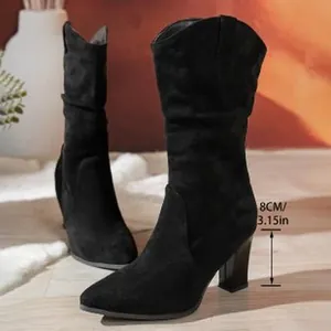 Detailed view of black slouch mid-calf high-heeled boots with 8cm chunky heel