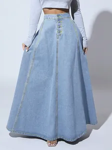 Elegant high-waist denim A-line skirt with front buttons and yellow contrast stitching.