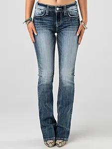 Detailed front view of women's high-waisted denim jeans with embroidery and heavy wash