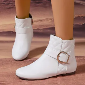 Elegant white quilted Chelsea boots with gold buckle strap and flat sole for women