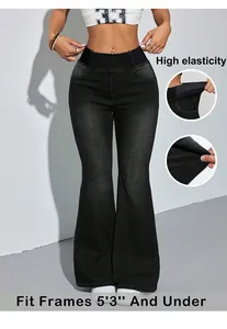 Detail view of black high-waisted flared jeans showing high elasticity and petite fit