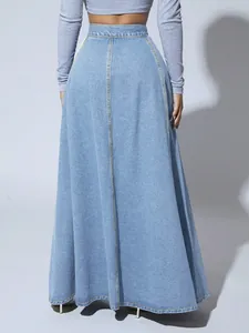 Back view of a high-waisted A-line denim maxi skirt with stylish contrast stitching.