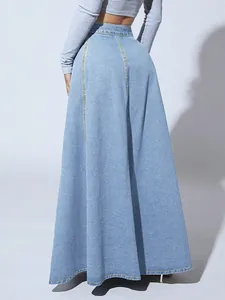 Back view of a light wash denim A-line maxi skirt showing flattering fit and long silhouette.