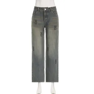 Jeans vintage a gamba larga da donna con stampa gotica H ed effetto lavaggio invecchiato