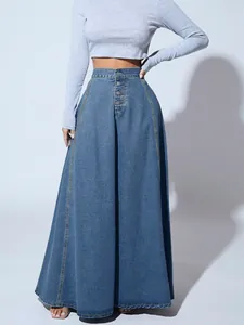 Detailed view of the Western style denim A-line maxi skirt featuring a front button fly