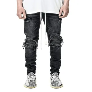 Slim fit distressed black biker jeans with knee ribbing and long white drawstring