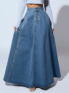 Detailed front view of an A-line denim maxi skirt featuring a button-up waist.