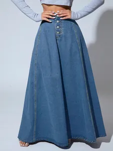 High-waisted long denim A-line skirt featuring a stylish button-up front design