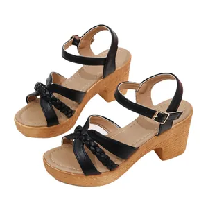 Women's black round toe chunky heel sandals with ankle straps and braided details