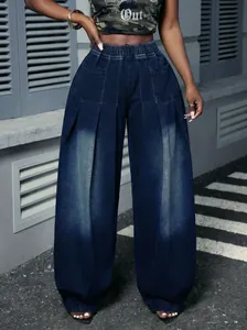 Vintage washed blue pleated wide-leg balloon jeans with elastic high waist styling