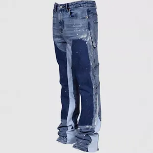 Stijlvolle heren denim cargo patchwork jeans met verfspatten en gestapeld uitlopend design