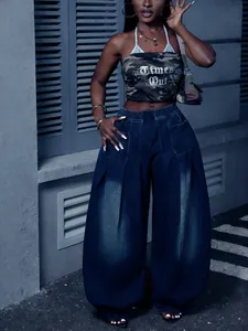 Retro vintage washed blue pleated wide-leg jeans with high waist lantern silhouette