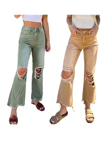 High-quality women's ripped straight-leg jeans in sage green and tan showing denim texture.