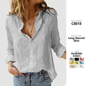 Detailed view of women's long-sleeved button-down linen shirt with available color swatches