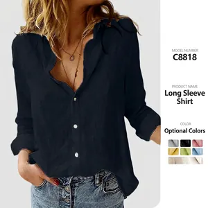 Detail view of women's long-sleeve button-up casual solid color shirt in navy blue