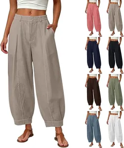 Detailed view of women's loose high waisted harem pants available in multiple colors