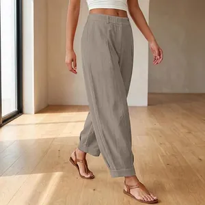Comfortable high-waisted cropped harem pants in neutral grey featuring a relaxed fit.