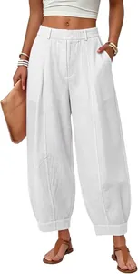 Detailed view of women's loose-fitting white harem pants with elegant pleated front design