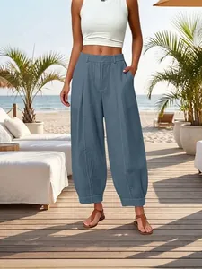 Elegant high-waisted blue harem pants for women in a relaxed fit beach style