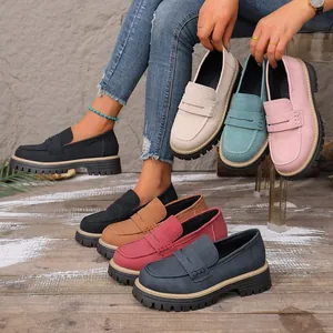 Variety of colorful matte suede loafers with thick soles for women in a casual setting