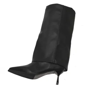 Elegant black pointed-toe fashion boots featuring a stylish fold-over shaft design