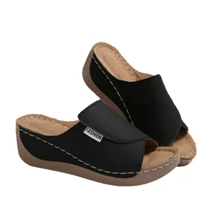 Stylish black platform wedge peep toe sandals for women with stitching details