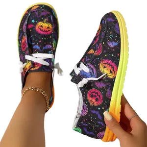 Stylish Halloween themed canvas loafers featuring colorful pumpkin and bat prints for women