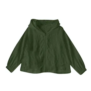 Detailed view of the dark green hooded sun protection jacket with jacquard texture.