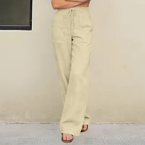 Detailed view of high-waisted beige wide-leg casual pants with drawstring and pockets.