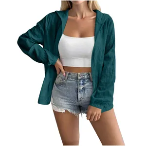 Detail showing texture of dark teal jacquard hooded sunscreen jacket for women.